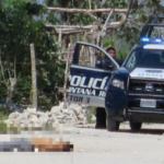 Encuentran dos cuerpos ensabanados en camino de terracería de la Región 206 de Cancún